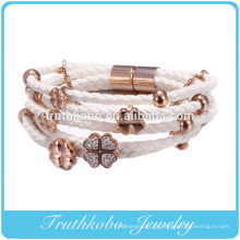 Novo design rosa de ouro de alta imitação de diamante de quatro folhas trevo pulseira corda pulseira de couro